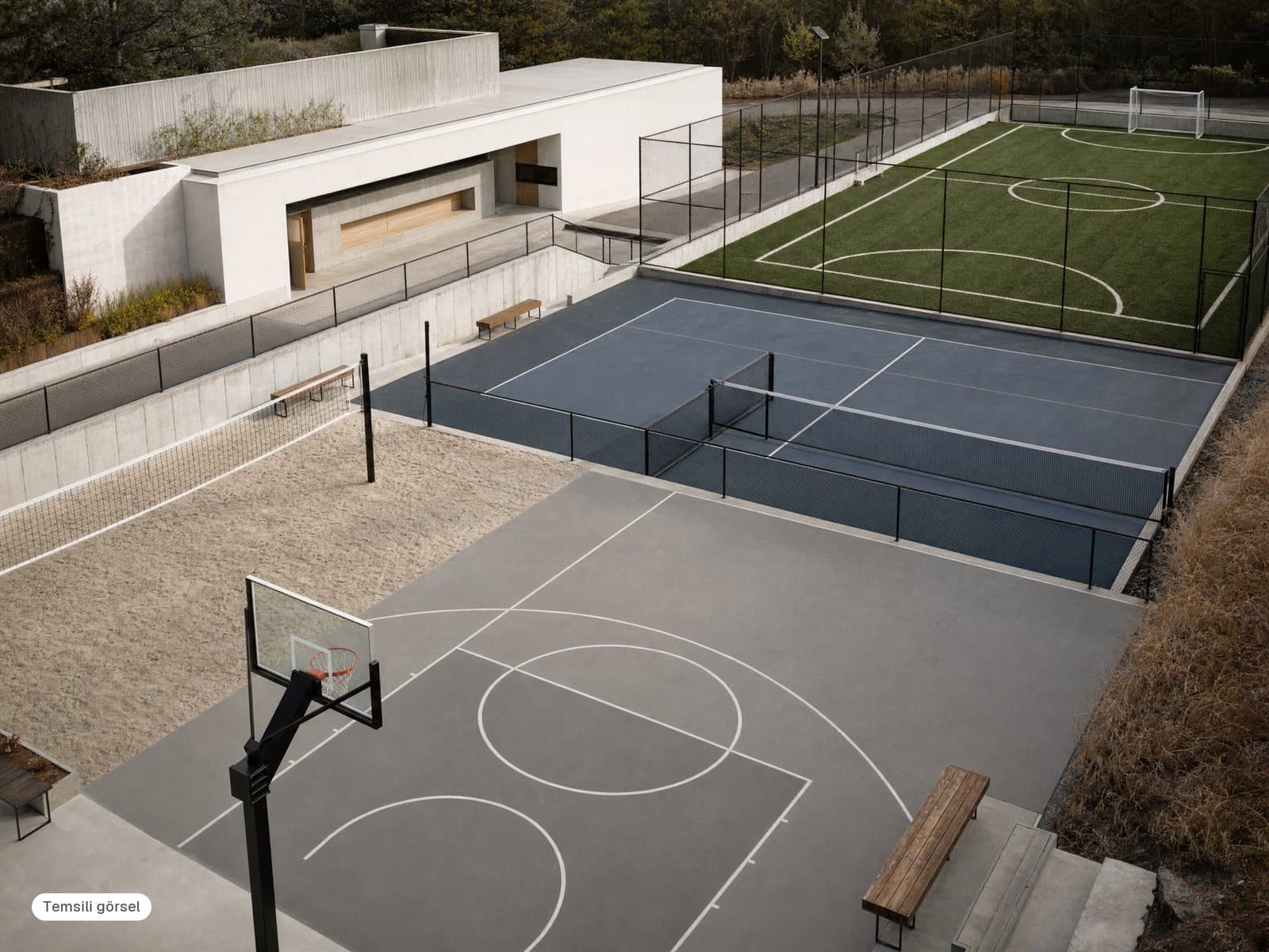 Basketbol, voleybol, tenis ve halı saha bulunan bir açık spor tesisi (temsili görsel)